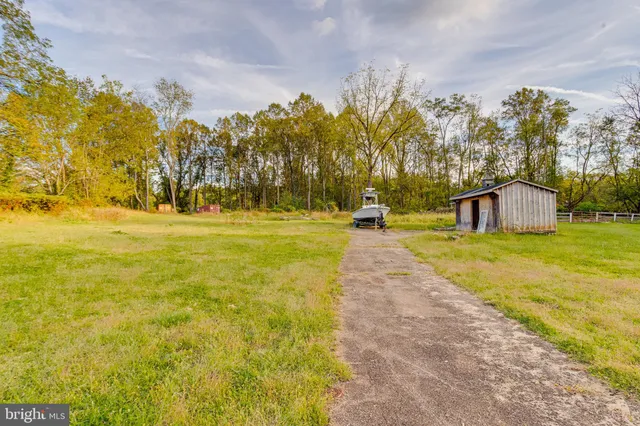 a swimming pool with wooden fence