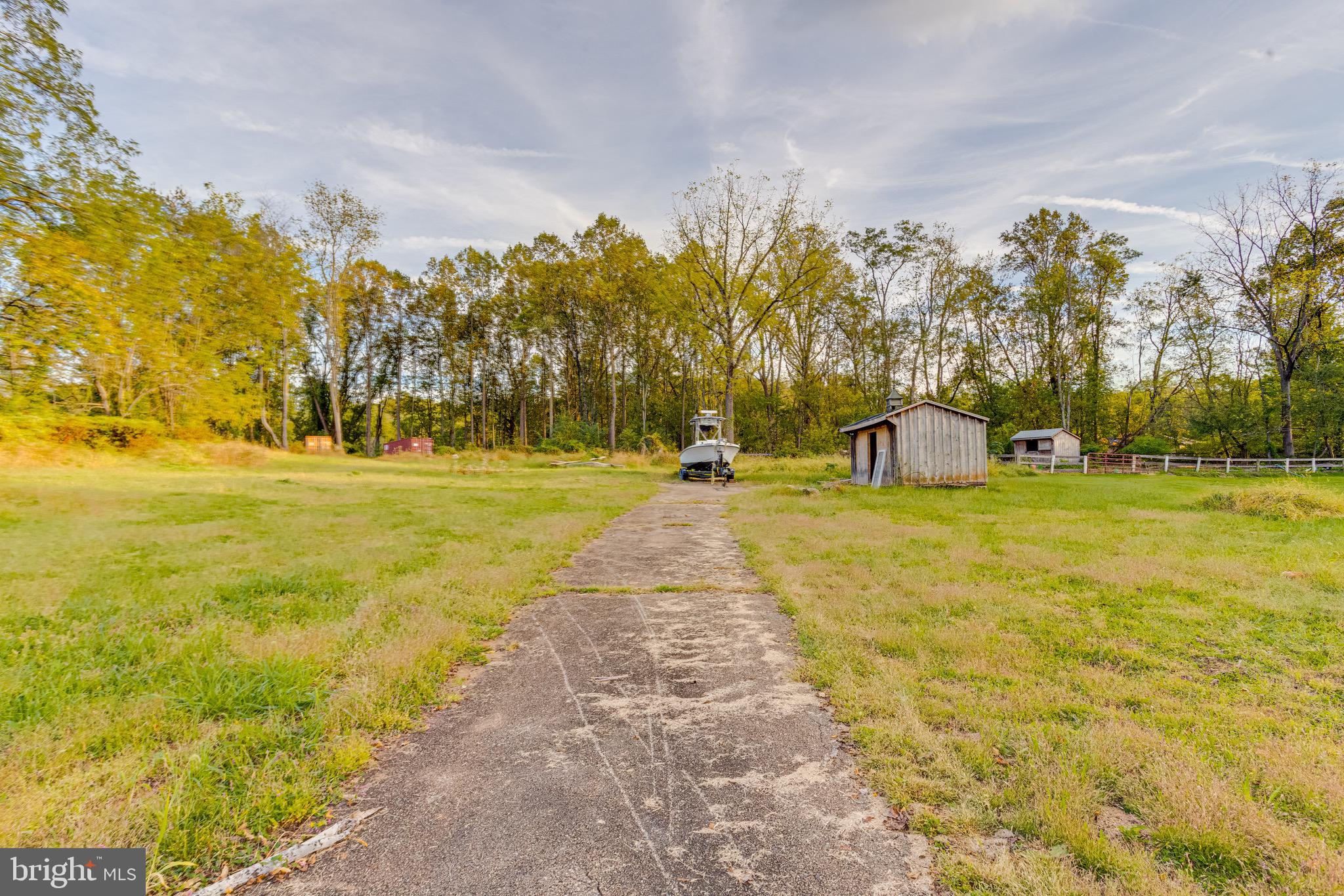 3243 Dublin Road Street, MD 21154 - Photo 2 of 21 a swimming pool with trees in the background