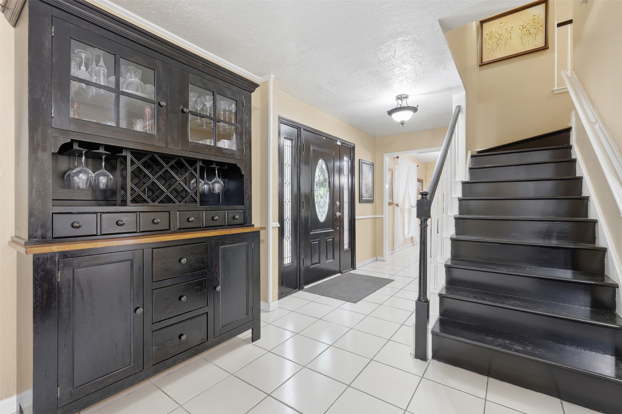 7010 River Mill Drive Spring, TX 77379 - Photo 4 of 29 a view of an entryway with wooden floor and cabinets