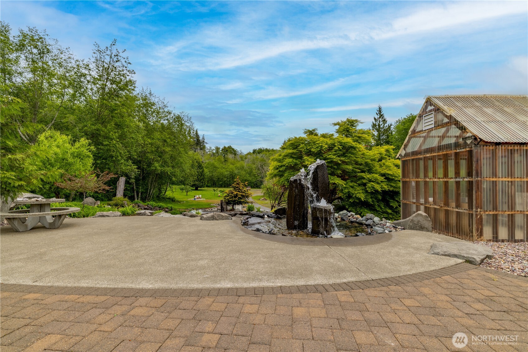 741 Southeast Cook Plant Farm Road Shelton, WA 98584 - Photo 6 of 38 a view of a backyard with a patio