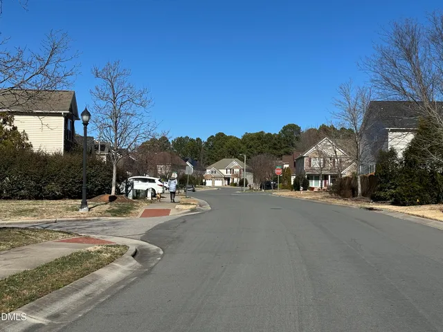 a view of a street with a houses