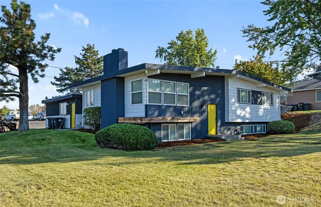 a view of a house with a swimming pool