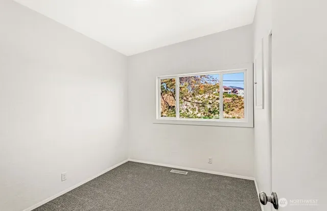 an empty room with a window