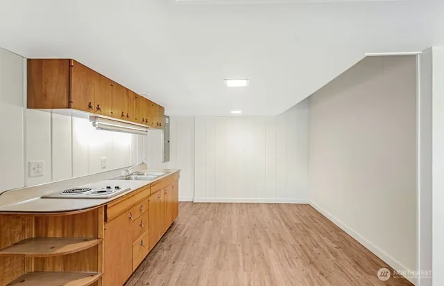 a bathroom with a sink a mirror and a bathtub