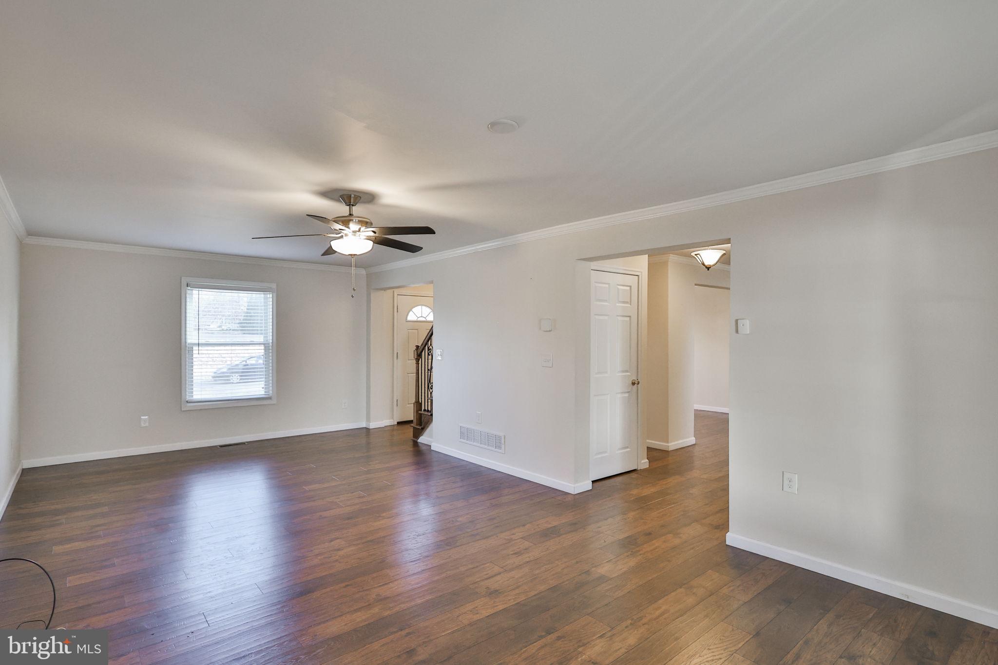 2811 Kingsview Avenue Easton, PA 18045 - Photo 13 of 86 a view of an empty room with wooden floor and a window
