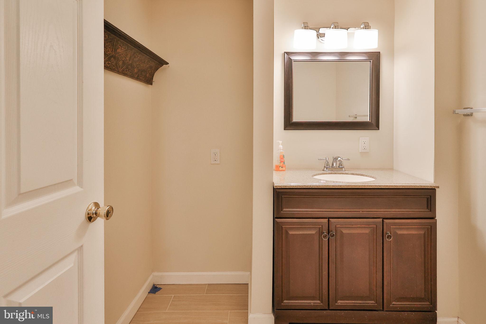 2811 Kingsview Avenue Easton, PA 18045 - Photo 18 of 86 a bathroom with a sink and a mirror