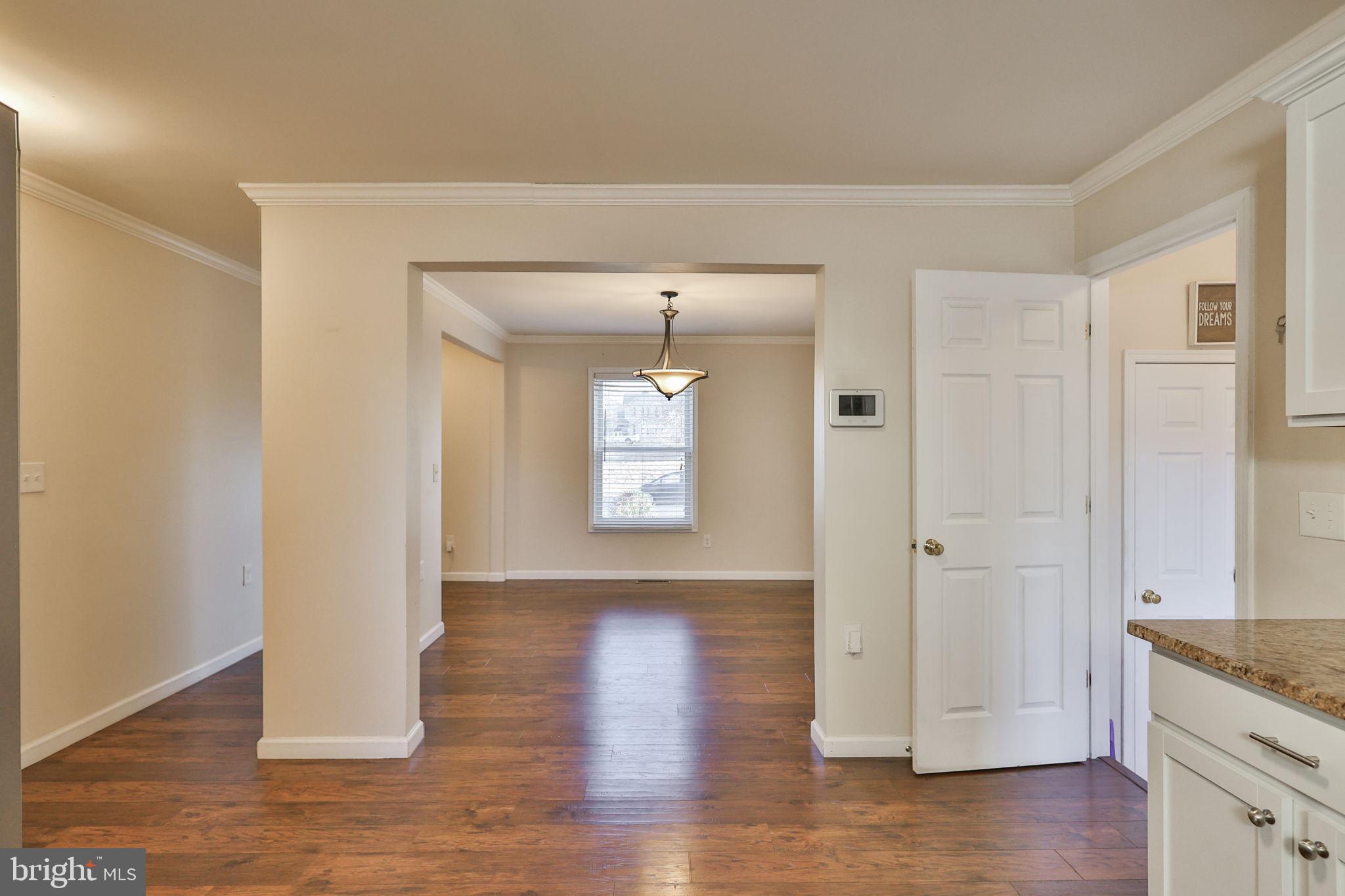 2811 Kingsview Avenue Easton, PA 18045 - Photo 29 of 86 a view of an empty room with wooden floor and a window