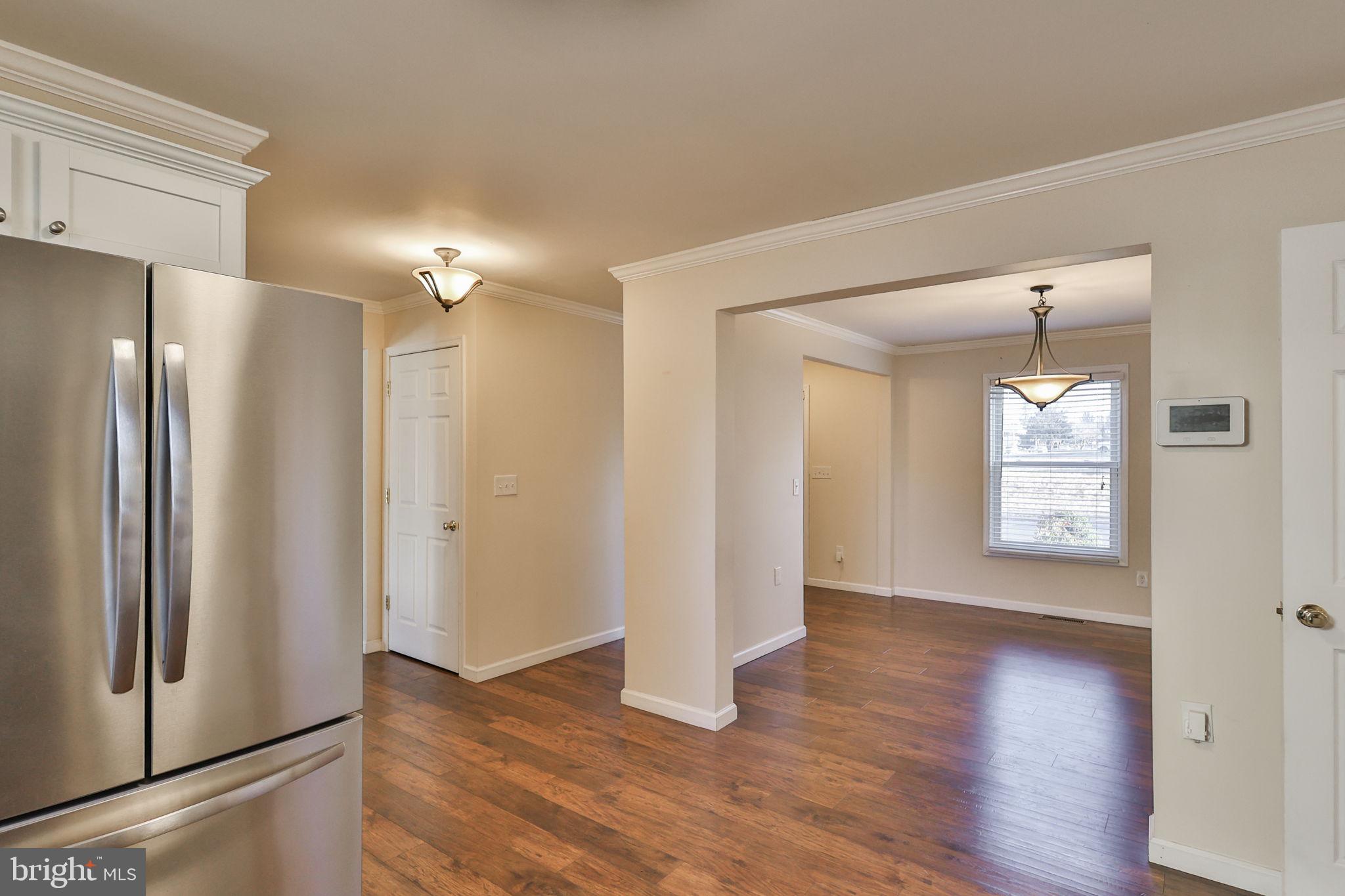 2811 Kingsview Avenue Easton, PA 18045 - Photo 30 of 86 a view of an empty room with window and wooden floor