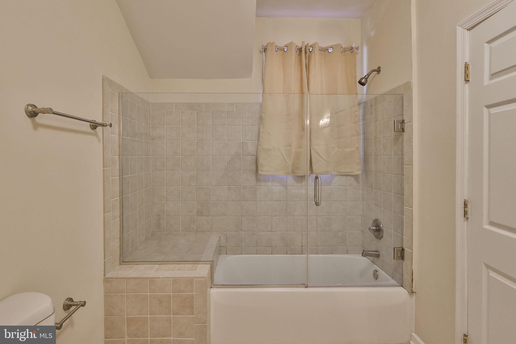 2811 Kingsview Avenue Easton, PA 18045 - Photo 44 of 86 a bathroom with a shower a toilet and bathtub