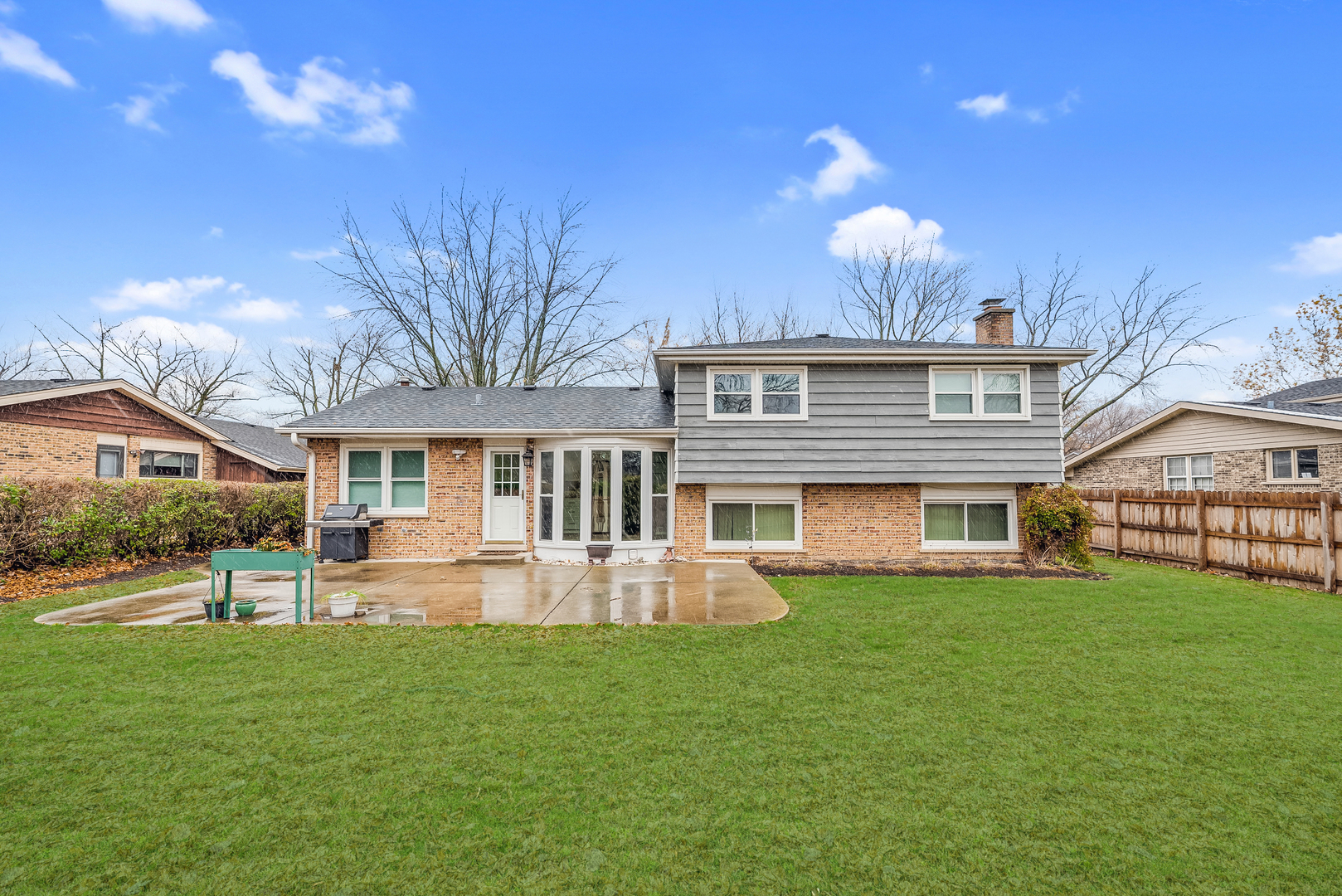 3231 Maple Leaf Drive Glenview, IL 60026 - Photo 32 of 36 a view of a house with a yard and sitting area