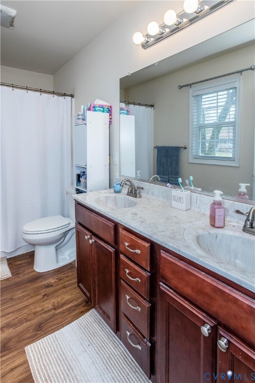 6720 River Road Petersburg, VA 23803 - Photo 14 of 29 Double vanity primary bathroom with great lighting