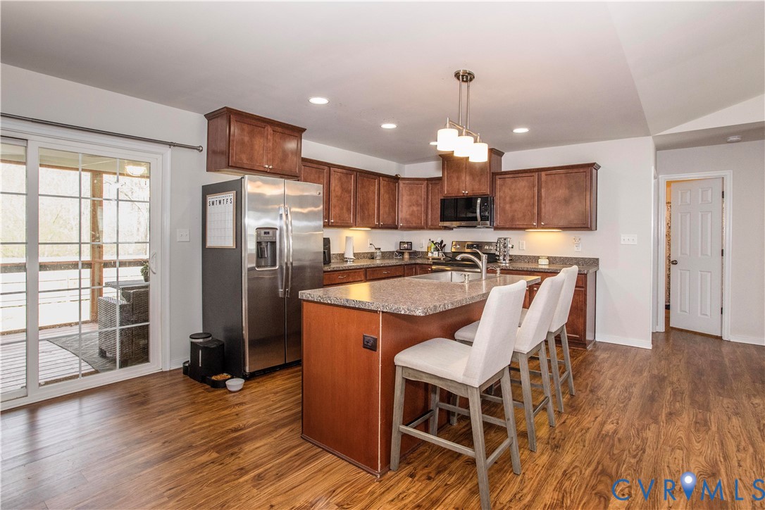 6720 River Road Petersburg, VA 23803 - Photo 7 of 29 Large kitchen with bar top island and tons of cabi