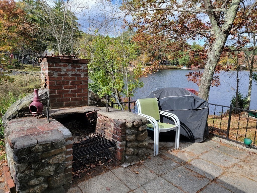 301 Beaver Lake Road Ware, MA 01082 - Photo 16 of 38 a front view of a house with garden