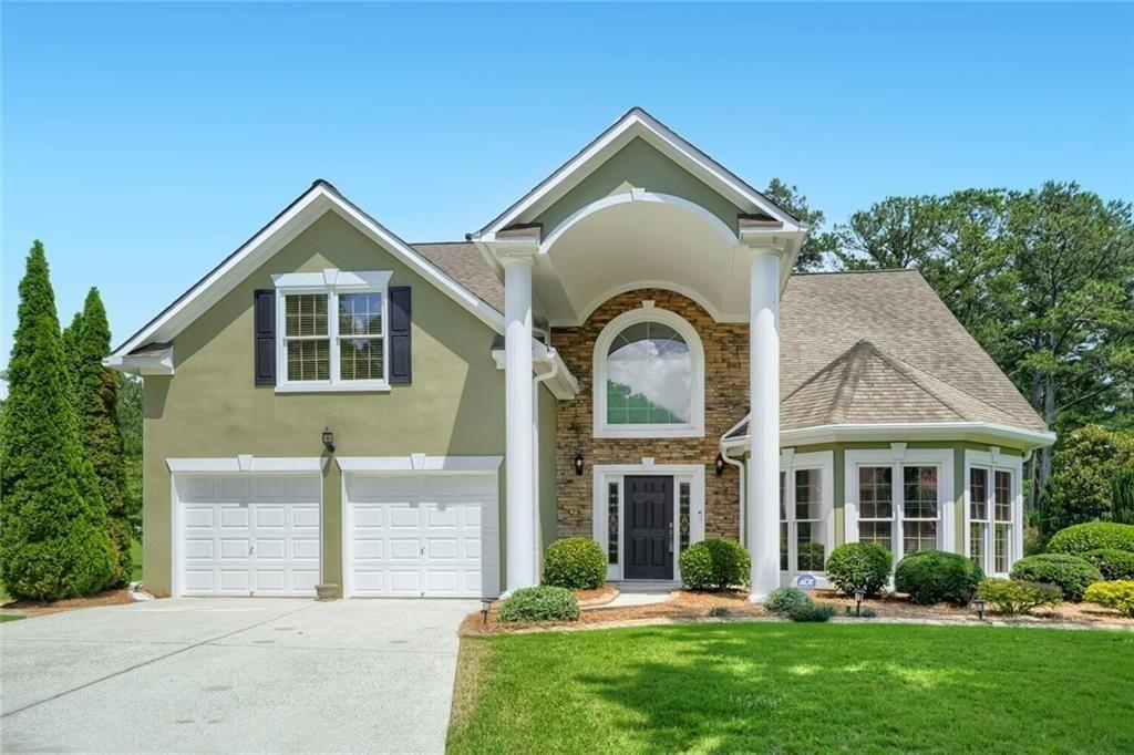 3413 Doe's Court Villa Rica, GA 30180 - Photo 1 of 37 front view of a house with a yard