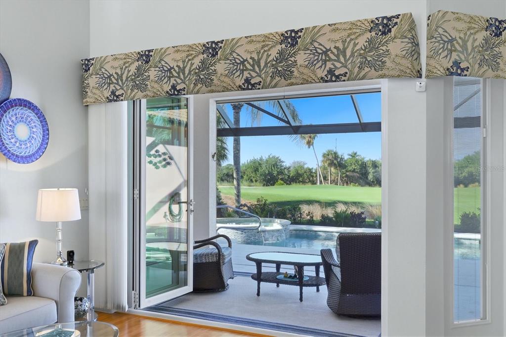 3606 Pennyroyal Road Port Charlotte, FL 33953 - Photo 18 of 96 a view of a livingroom with furniture and front door