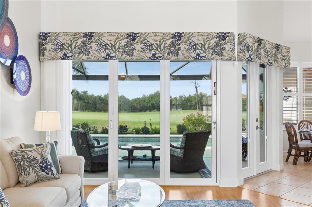 3606 Pennyroyal Road Port Charlotte, FL 33953 - Photo 22 of 96 a living room with furniture and a large window