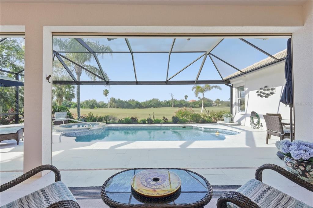 3606 Pennyroyal Road Port Charlotte, FL 33953 - Photo 49 of 96 a room with furniture and a large window