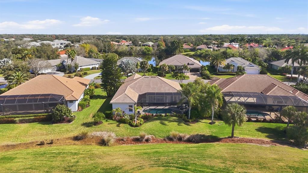 3606 Pennyroyal Road Port Charlotte, FL 33953 - Photo 68 of 96 an aerial view of residential houses with outdoor space and ocean view