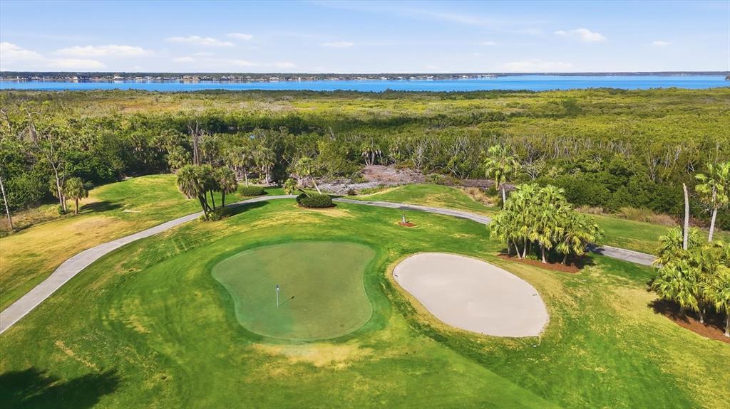 3606 Pennyroyal Road Port Charlotte, FL 33953 - Photo 71 of 96 a view of a swimming pool with an outdoor seating and yard