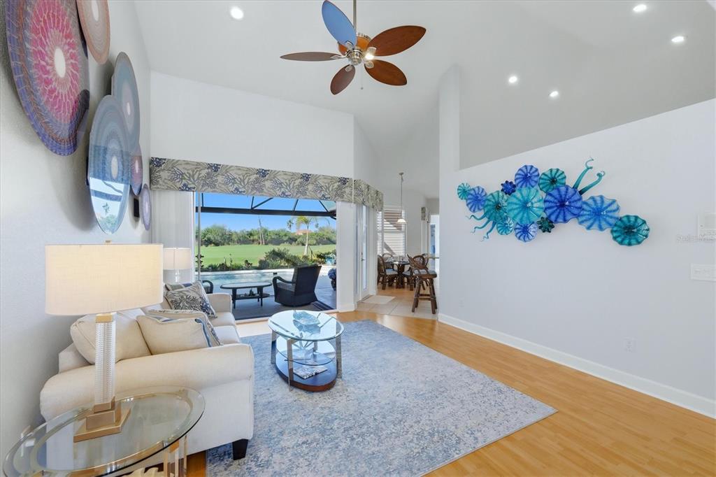 3606 Pennyroyal Road Port Charlotte, FL 33953 - Photo 10 of 96 a living room with furniture fireplace and a large window
