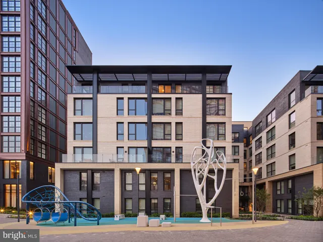a front view of a building with street view