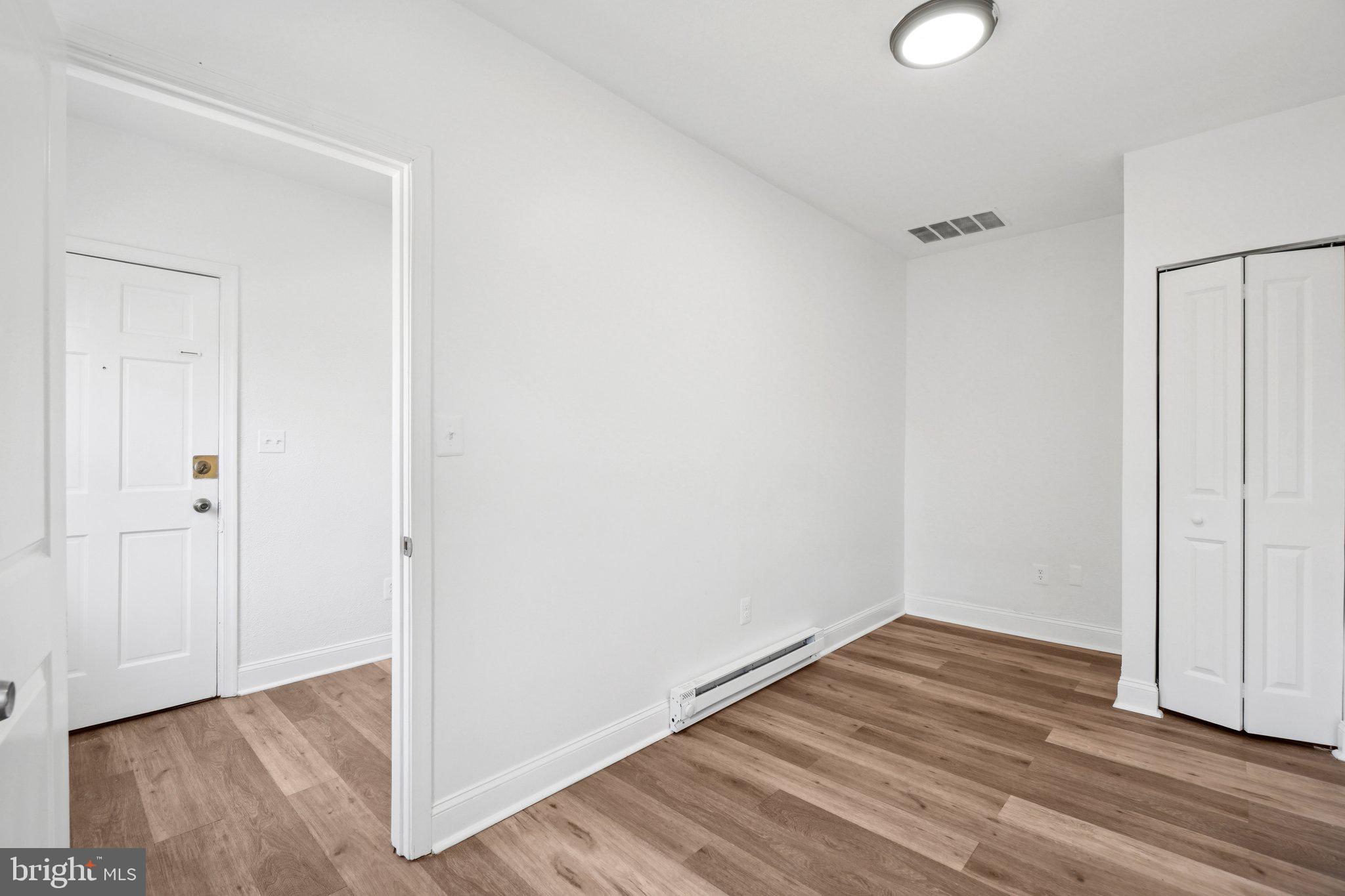 221 20th Street Northeast Washington, DC 20002 - Photo 19 of 26 a view of a room with wooden floor