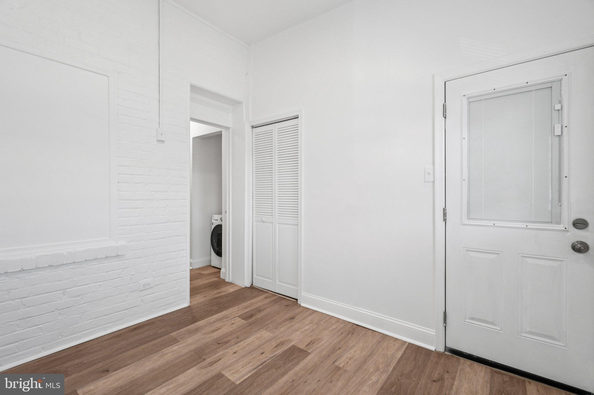 221 20th Street Northeast Washington, DC 20002 - Photo 8 of 26 wooden floor in an empty room