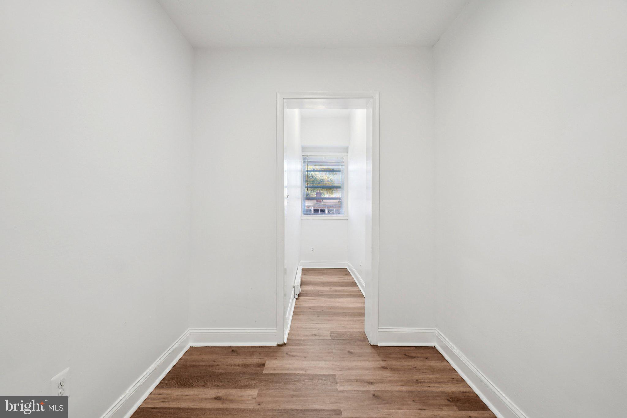 221 20th Street Northeast Washington, DC 20002 - Photo 10 of 26 a view of an empty room and wooden floor