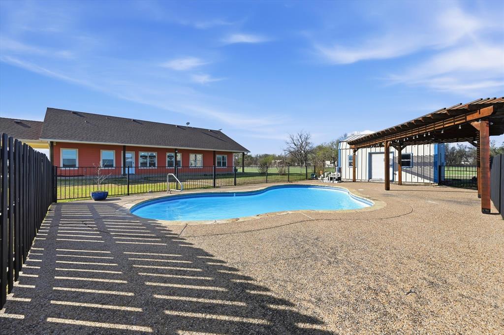 1616 Nash-Howard Road Waxahachie, TX 75165 - Photo 33 of 36 a view of swimming pool with outdoor seating and deck