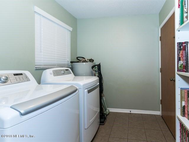 8143 Worm Wood Road Jacksonville, FL 32210 - Photo 17 of 22 017_Laundry