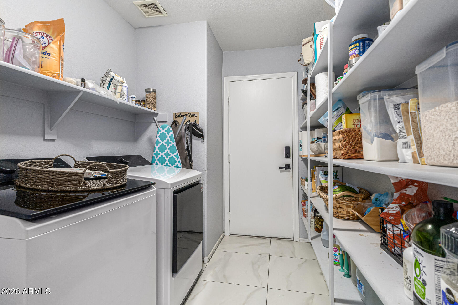 3033 East Santa Rosa Drive Gilbert, AZ 85234 - Photo 20 of 24 a utility room with dryer and washer