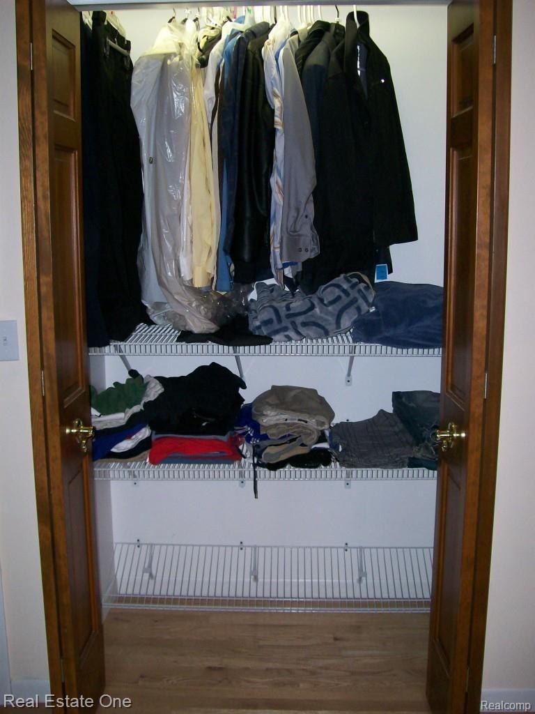 10509 Culver Road Brighton, MI 48114 - Photo 24 of 41 Master his&hers Closets