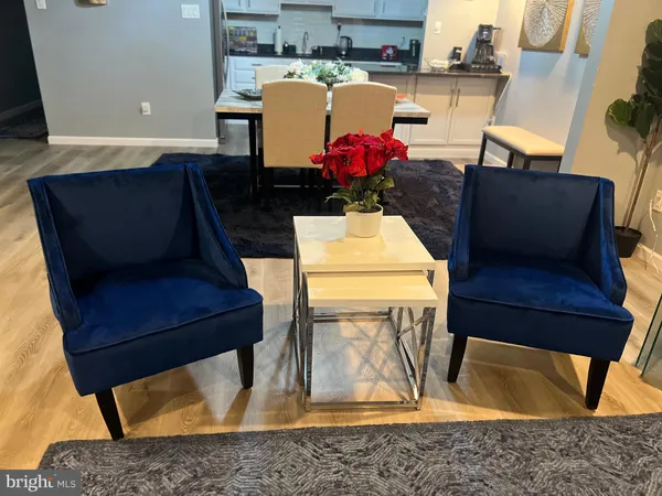 a living room with a couch and a table