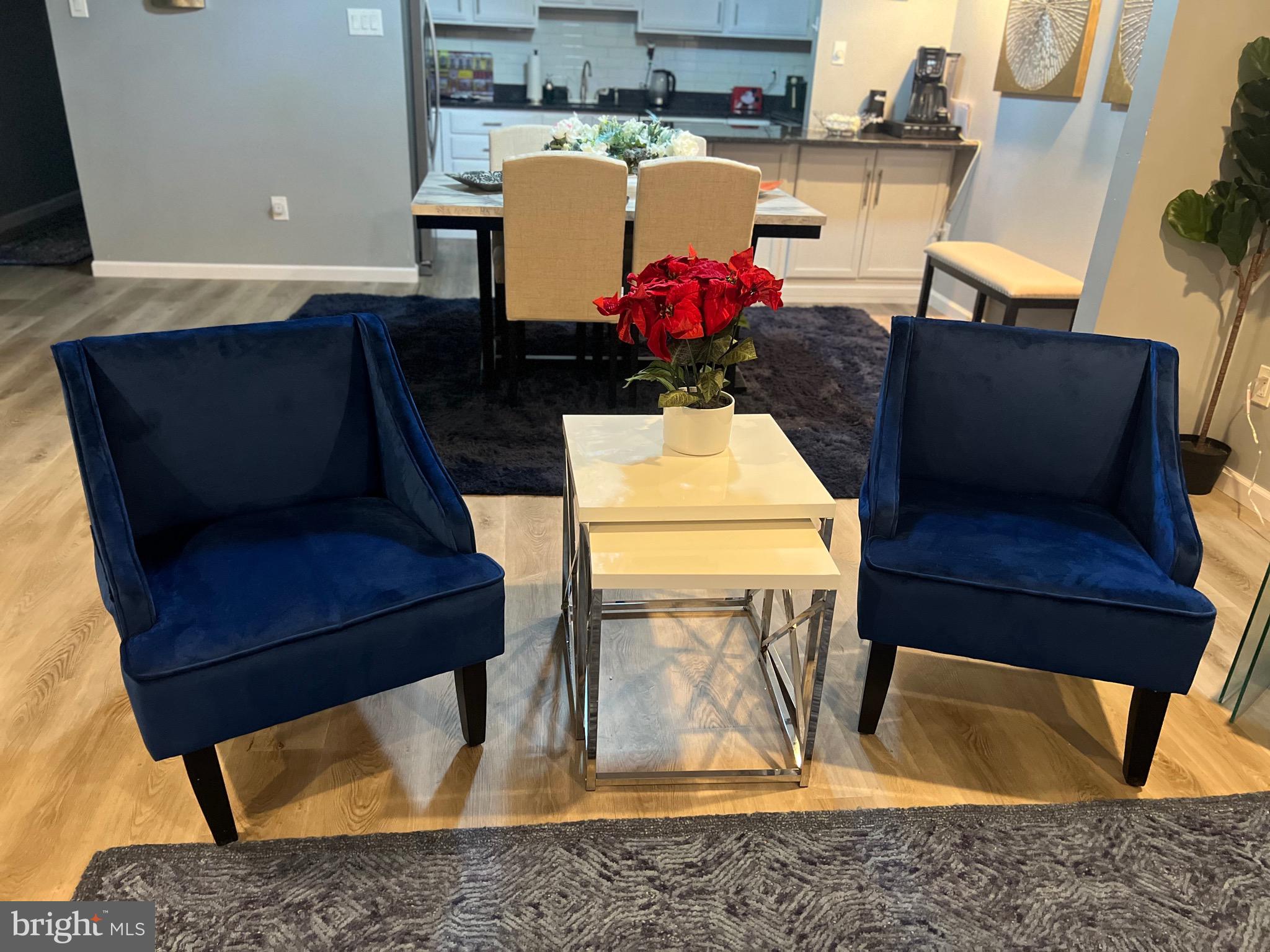 16 Township Line Road Elkins Park, PA 19027 - Photo 13 of 28 a living room with a couch and a table