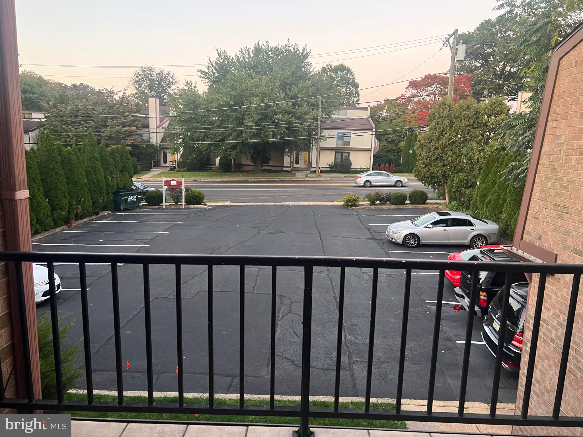 16 Township Line Road Elkins Park, PA 19027 - Photo 27 of 28 a view of a balcony with wooden floor and outdoor seating
