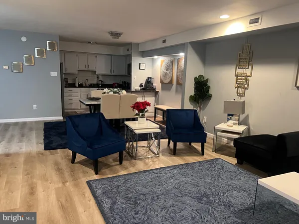 a living room with furniture and a table