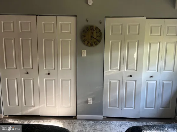 a view of a entryway with wooden floor