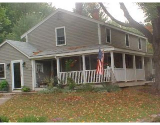 46 Wheeler Road Bolton, MA 01740 - Photo 1 of 1 a front view of a house with a yard
