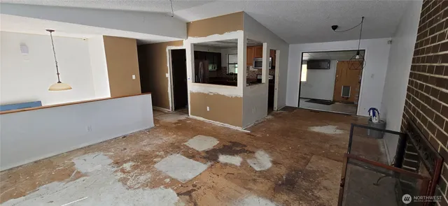 a view of a hallway with entryway