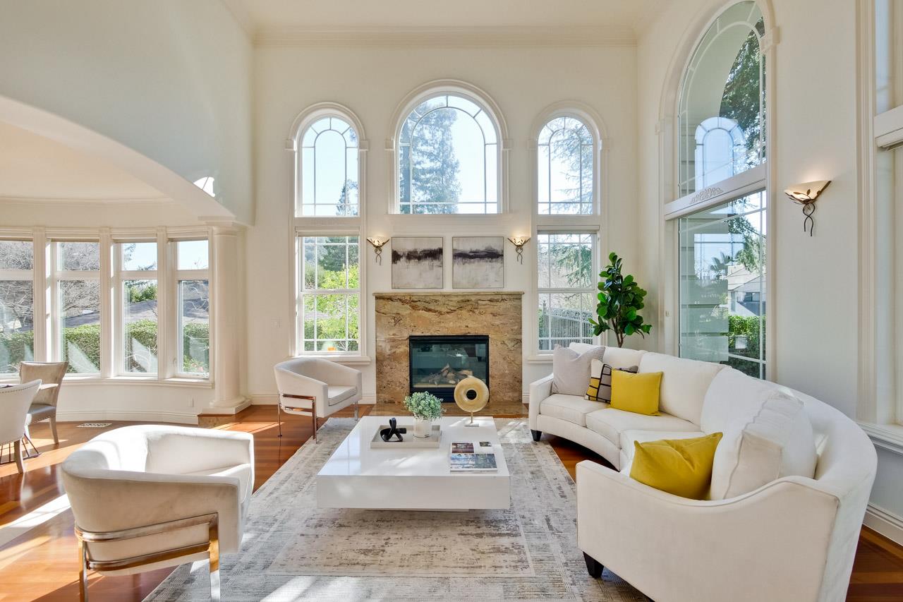 10935 Miramonte Road Cupertino, CA 95014 - Photo 11 of 71 a living room with furniture and a fireplace