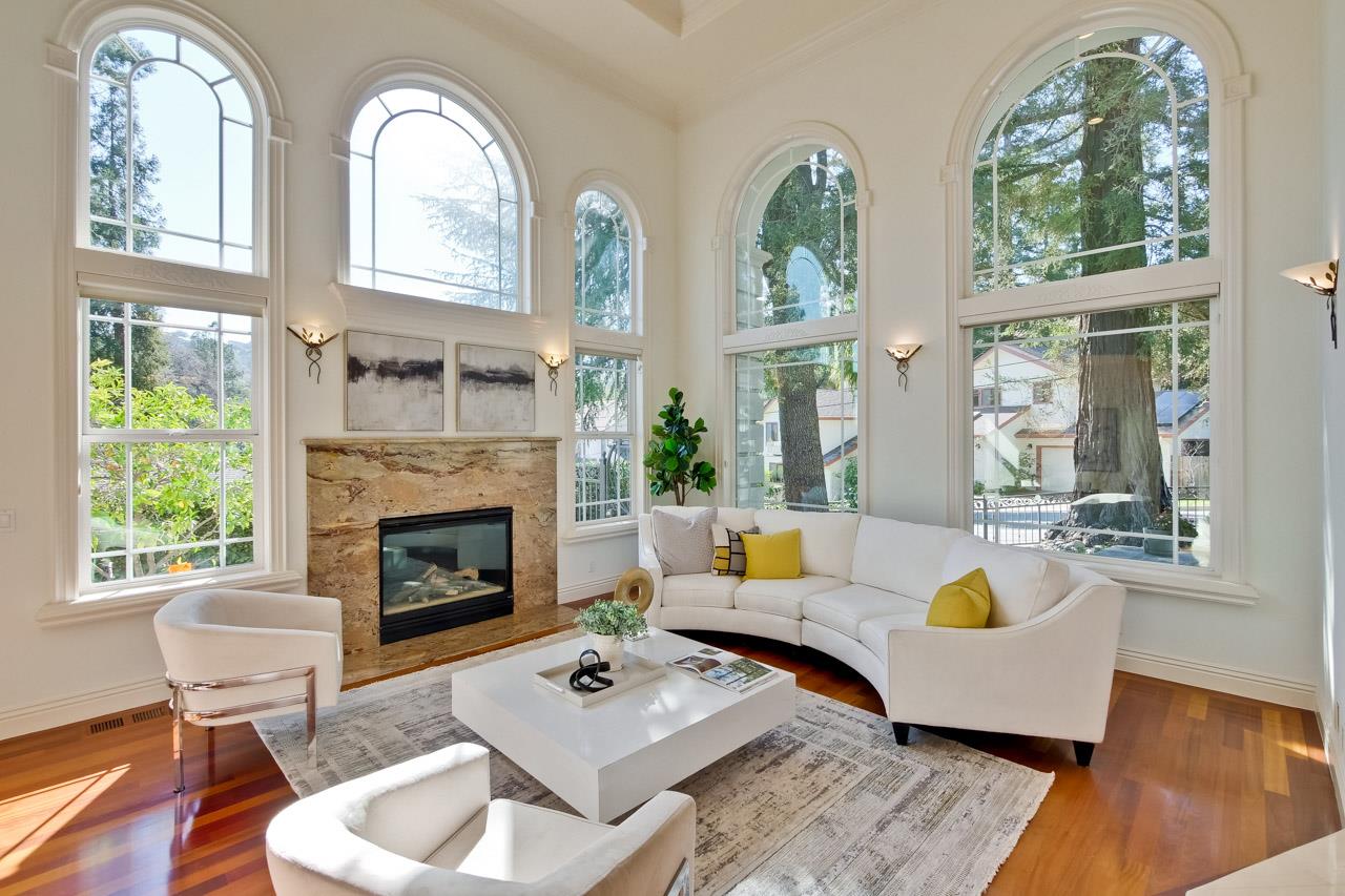 10935 Miramonte Road Cupertino, CA 95014 - Photo 12 of 71 a living room with furniture fireplace and window