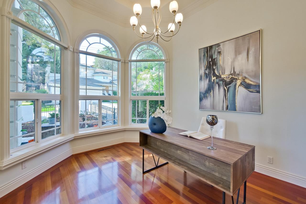10935 Miramonte Road Cupertino, CA 95014 - Photo 16 of 71 a view of a room with furniture large windows and wooden floor