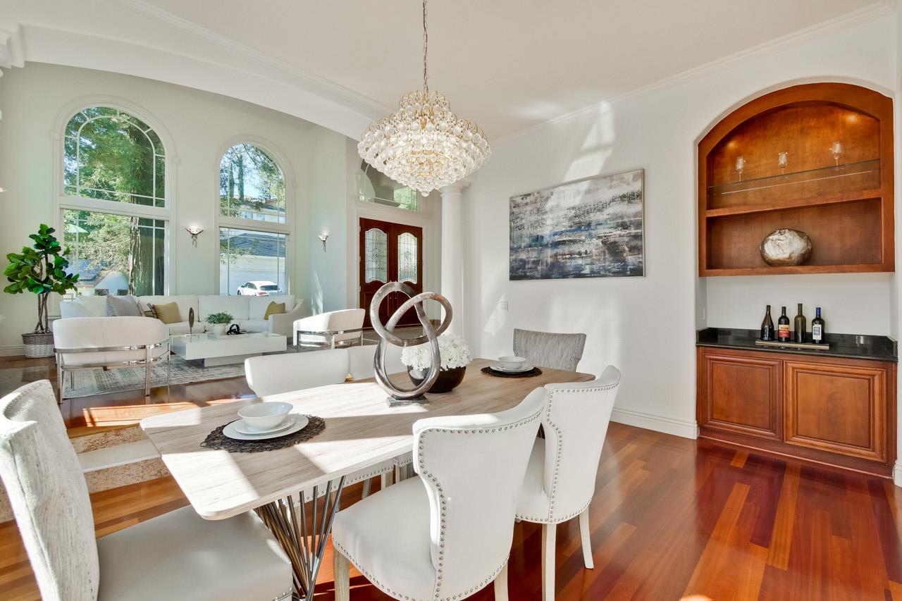 10935 Miramonte Road Cupertino, CA 95014 - Photo 19 of 71 a view of a dining room with furniture window and wooden floor