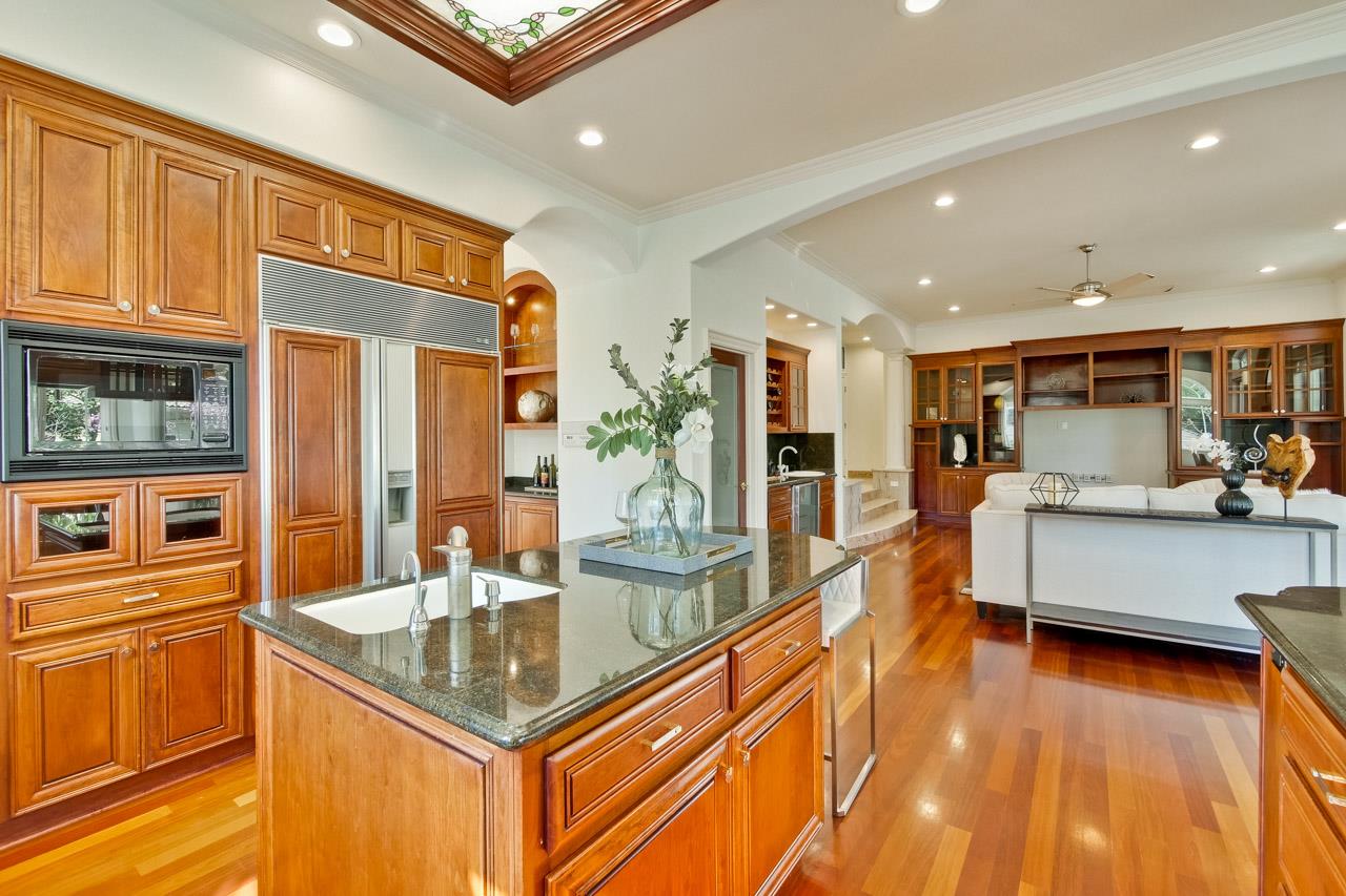 10935 Miramonte Road Cupertino, CA 95014 - Photo 22 of 71 a kitchen with stainless steel appliances granite countertop a sink and counter space