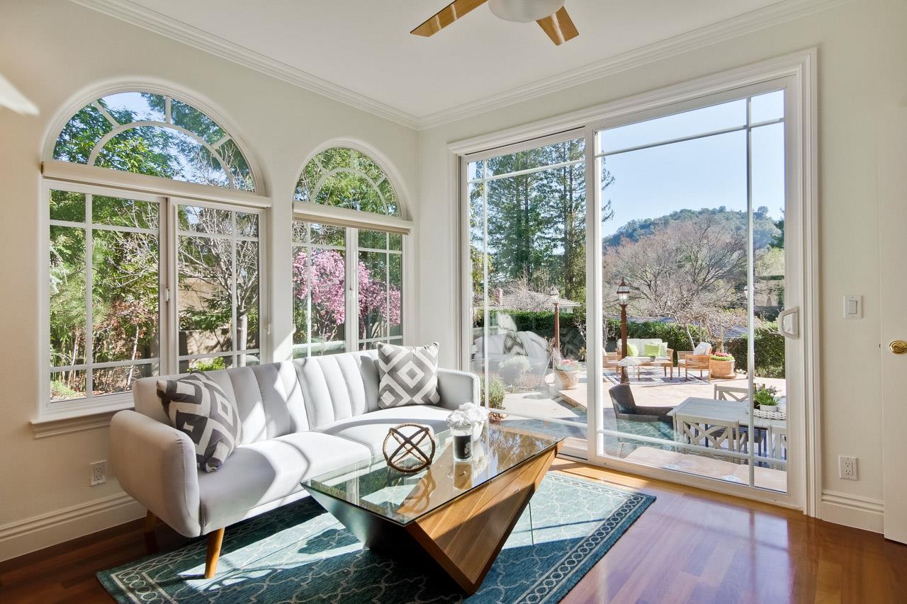 10935 Miramonte Road Cupertino, CA 95014 - Photo 32 of 71 a living room with furniture and a large window
