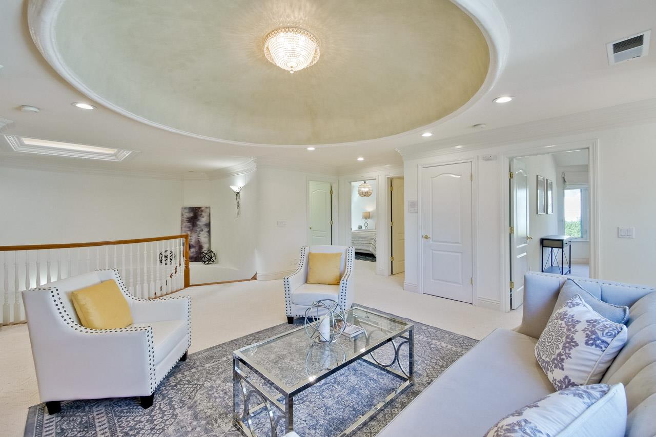 10935 Miramonte Road Cupertino, CA 95014 - Photo 44 of 71 a living room with furniture and a table