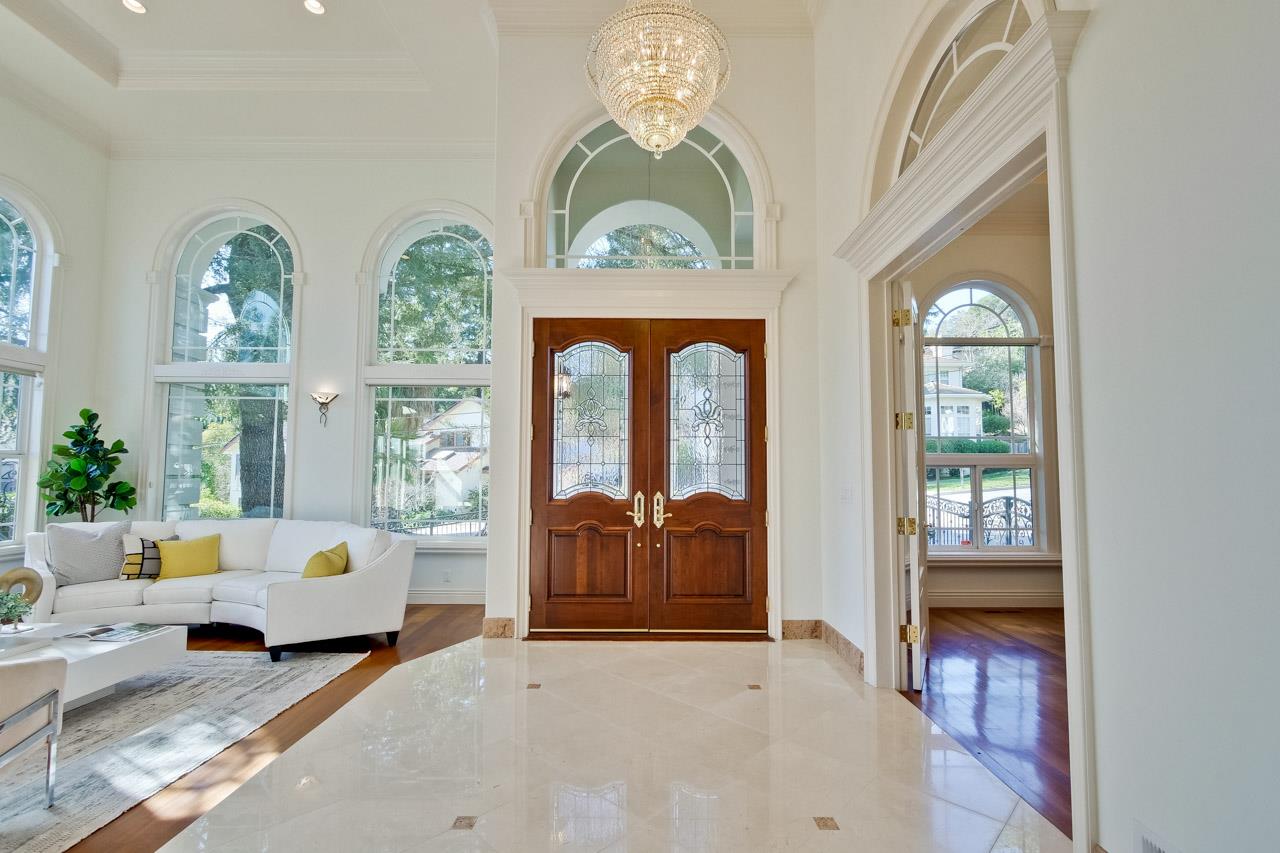 10935 Miramonte Road Cupertino, CA 95014 - Photo 5 of 71 a living room with furniture and a large window