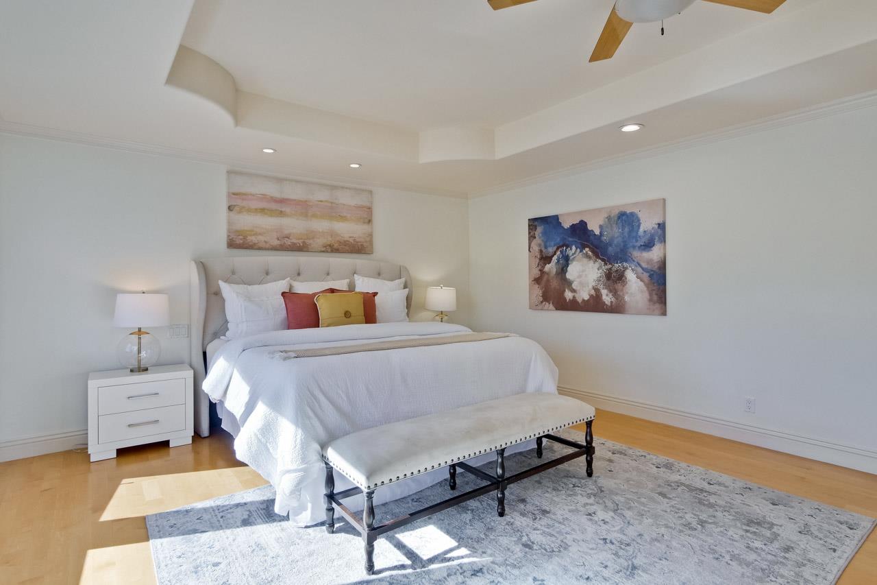 10935 Miramonte Road Cupertino, CA 95014 - Photo 55 of 71 a bedroom with a bed and a painting on the wall