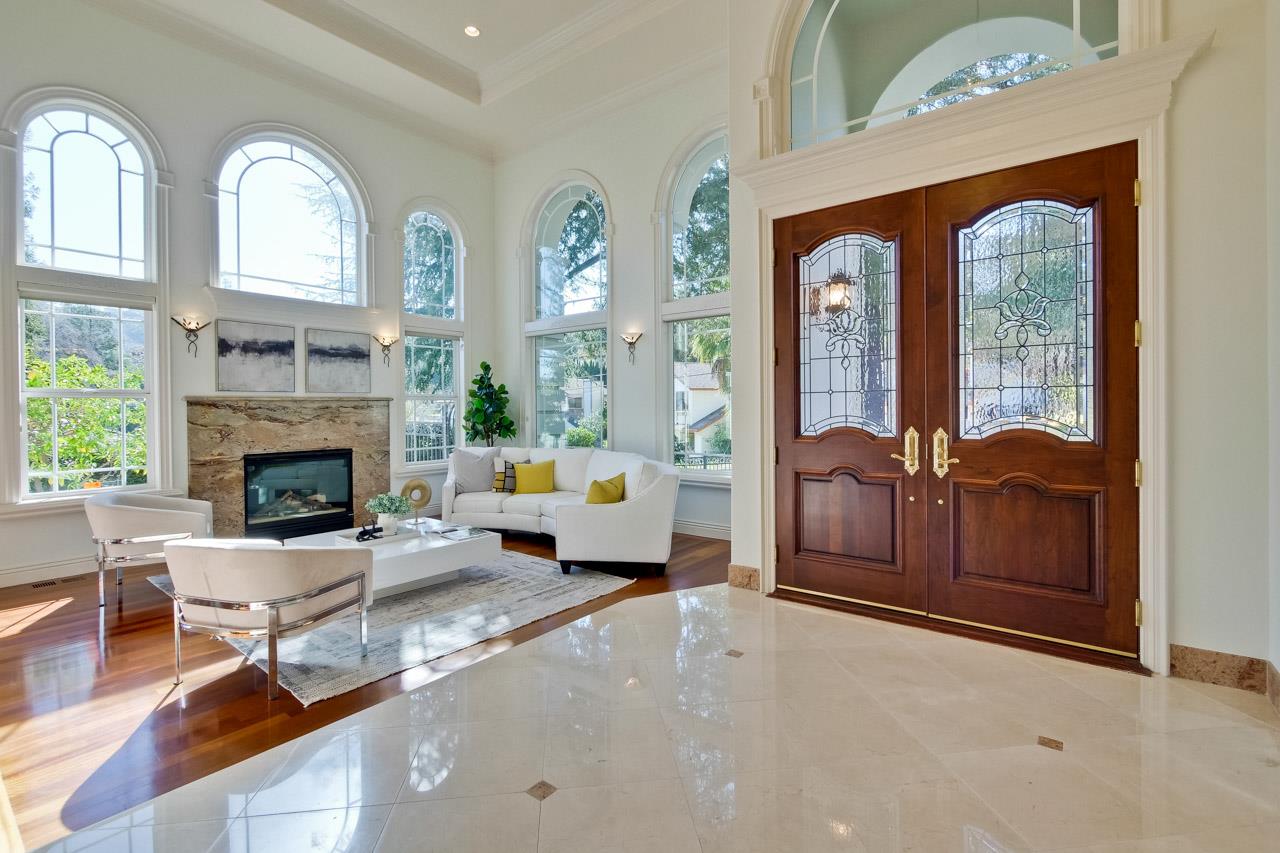 10935 Miramonte Road Cupertino, CA 95014 - Photo 6 of 71 a living room with furniture and a fireplace