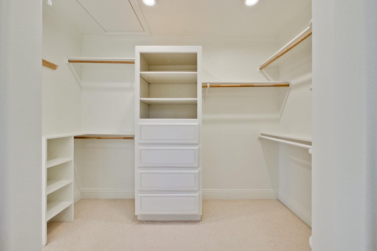 10935 Miramonte Road Cupertino, CA 95014 - Photo 62 of 71 a view of walk in closet with empty racks
